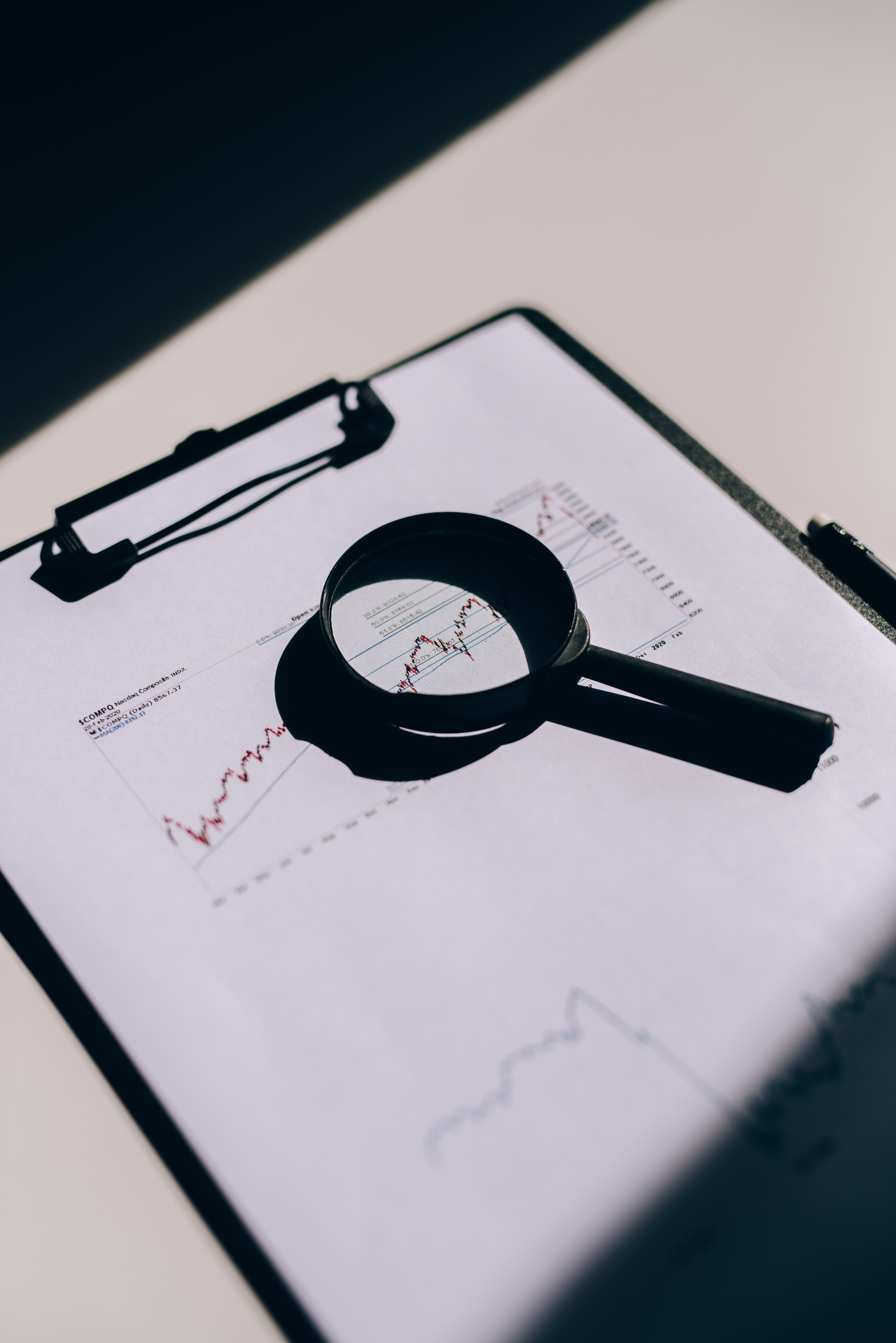 HR Audit magnifying glass and paperwork